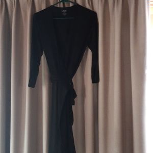 Black wrap dress. Knee length